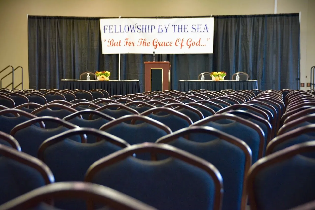 The meeting hall set up under the Fellowship By The Sea banner